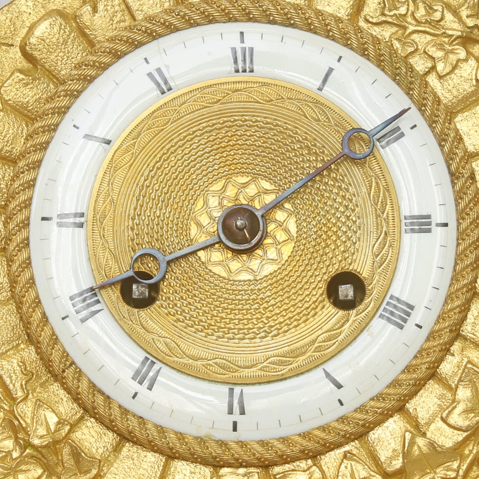 Empire vuurvergulde pendule
